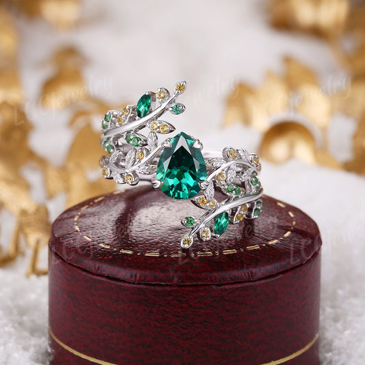 Leaf Inspired | Vintage pear cut emerald engagement ring set